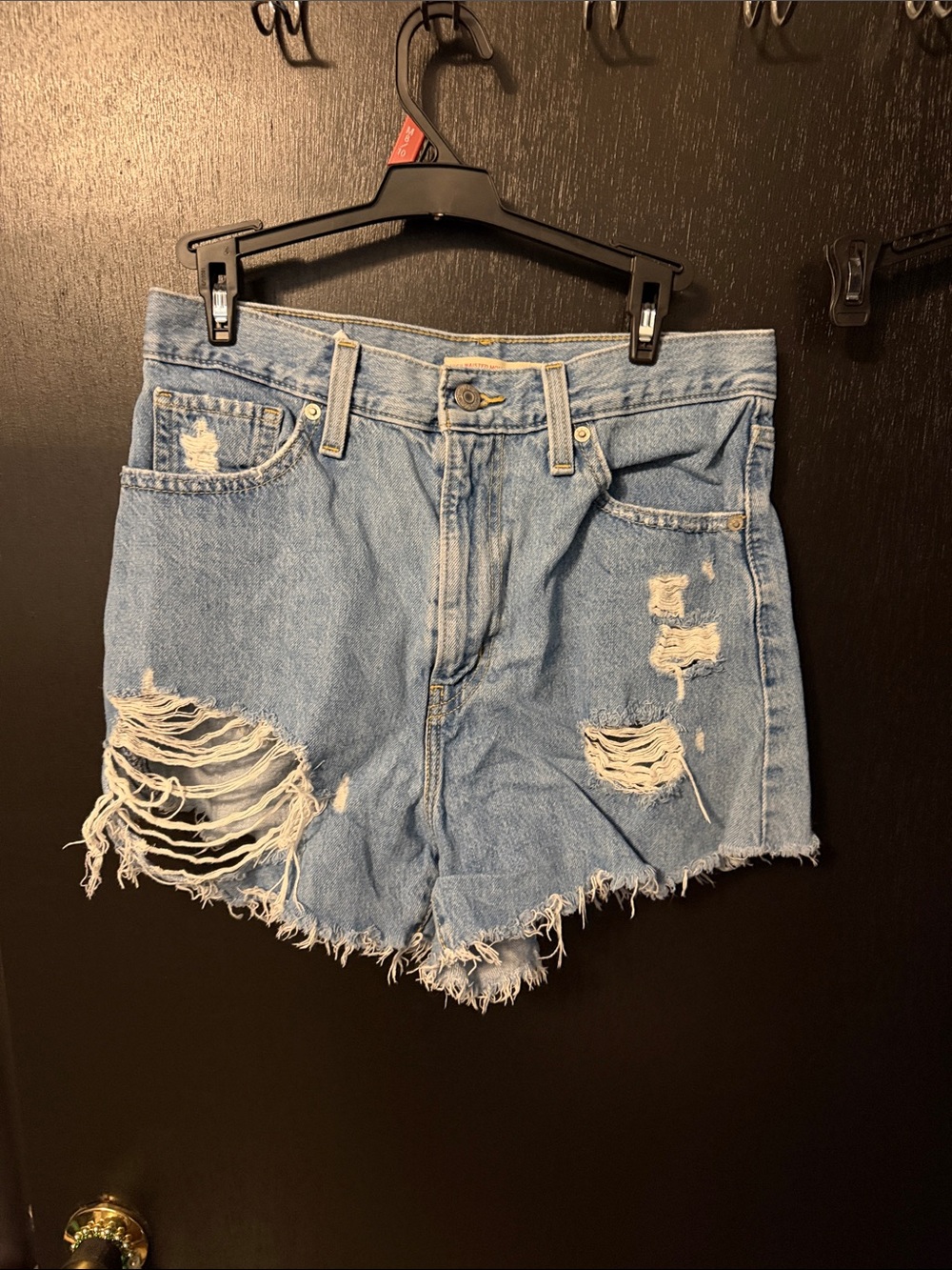 High-Rise Light Blue Distressed Denim Shorts